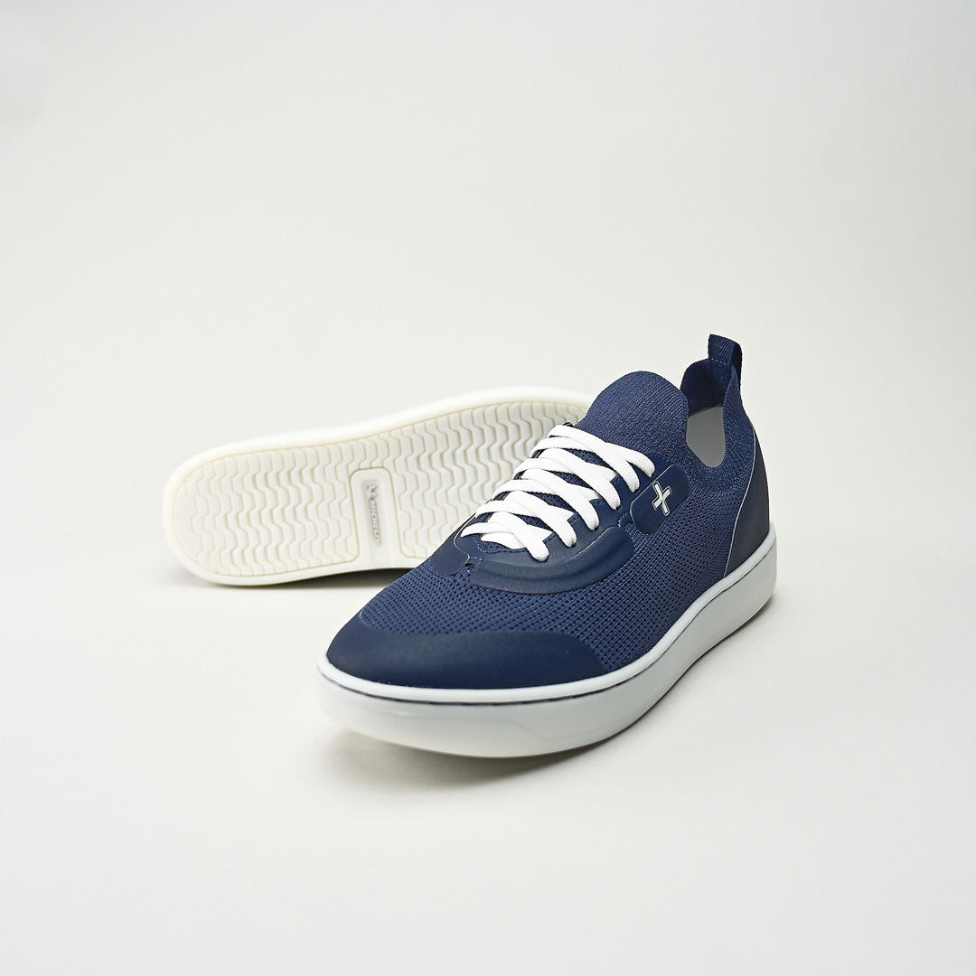 A blue pair of performance casual shoes